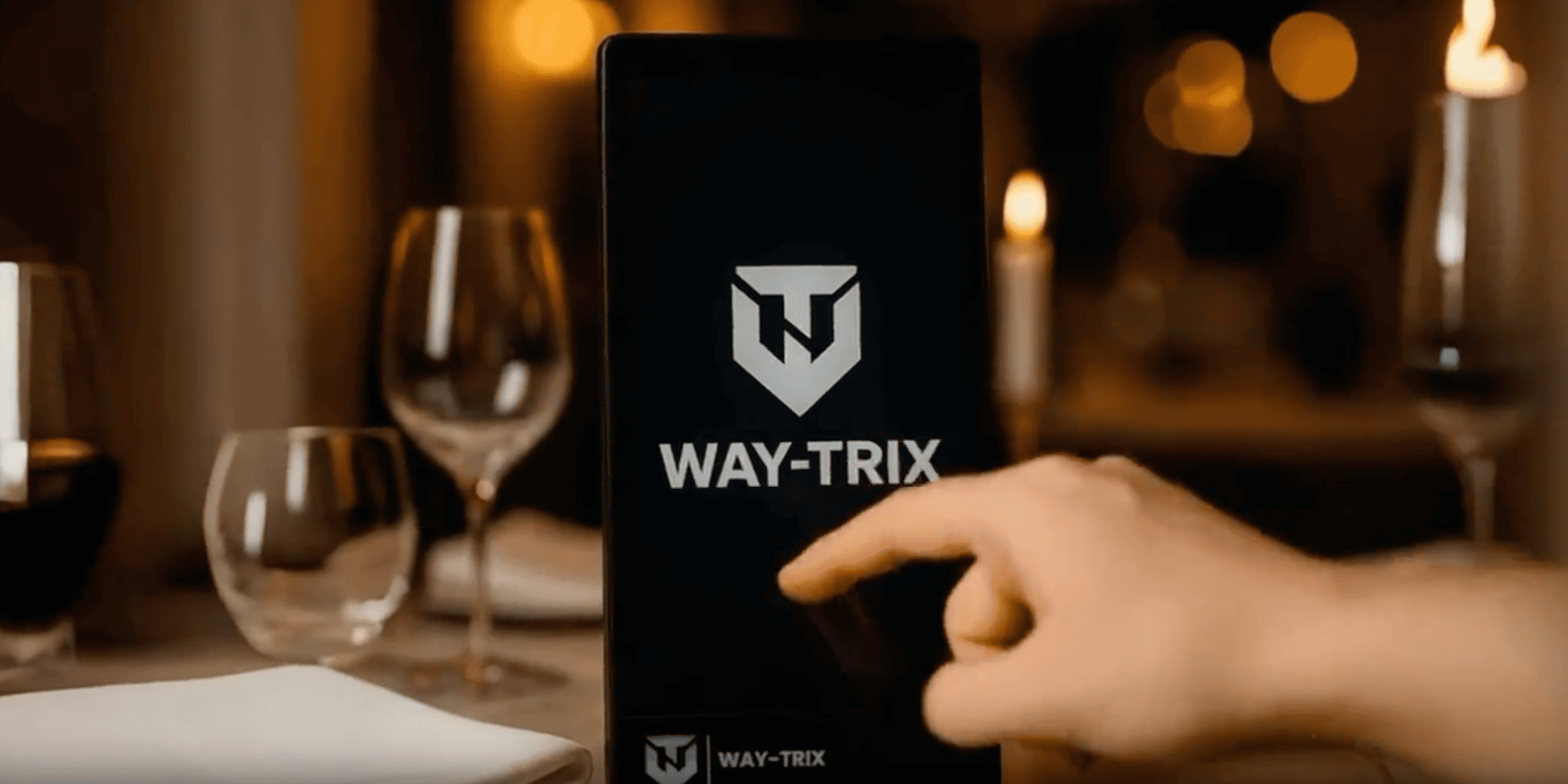A Waytrix tablet on a fine-dining table
