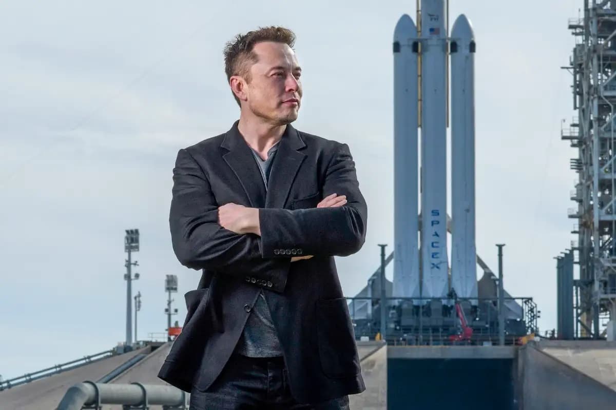 Elon Musk standing in front of a SpaceX rocket with a stock ticker showing SpaceX shares trading on the Nasdaq