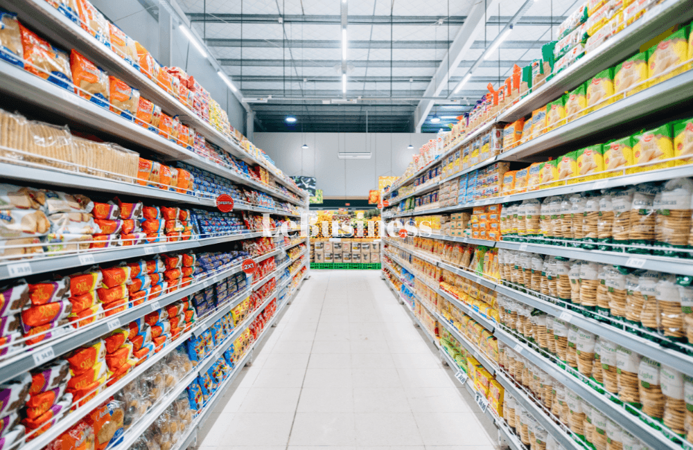 A Lebanese supermarket aisle with shelves of packaged goods and visible price tags