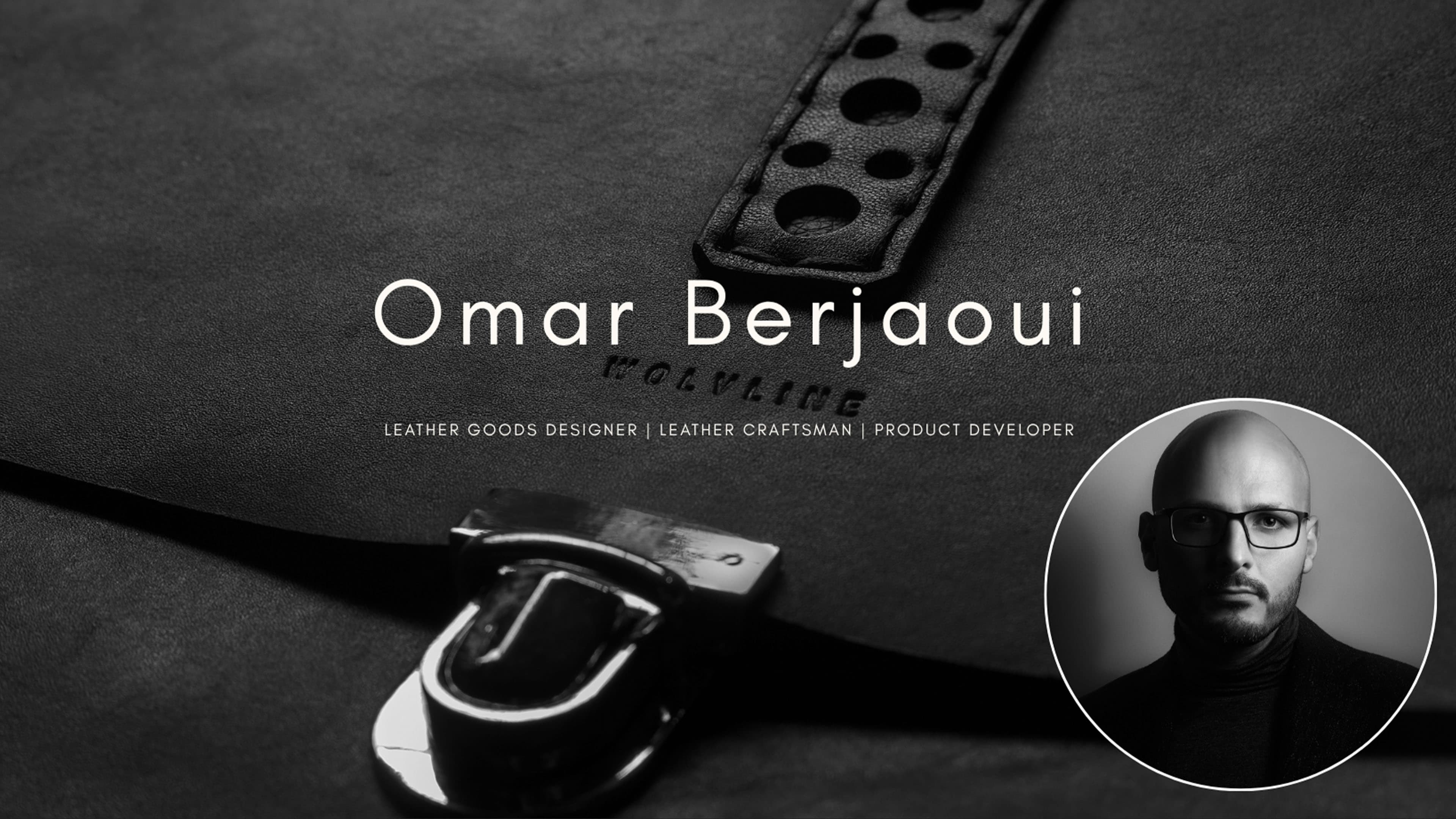 Black and white close up of a black leather strap with circular cutouts and a polished metal buckle, with the Wolvline logo embossed in the leather, Omar Berjaoui’s name and title in white text, and a circular portrait of him in a black turtleneck and glasses.